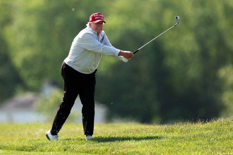 STERLING, VIRGINIA - MAY 25: Former President Donald Trump follows his second shot during the pro-am prior to the LIV Golf Invitational - DC at Trump National Golf Club on May 25, 2023 in Sterling, Virginia. (Photo by Rob Carr/Getty Images)