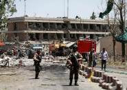 <p>Afghan officials inspect outside the German embassy after a blast in Kabul, Afghanistan, May 31, 2017. (Mohammad Ismail/Reuters) </p>