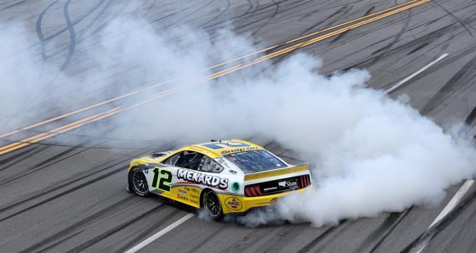 Ryan Blaney performs a burnout after winning the NASCAR Cup Series race at Talladega Superspeedway