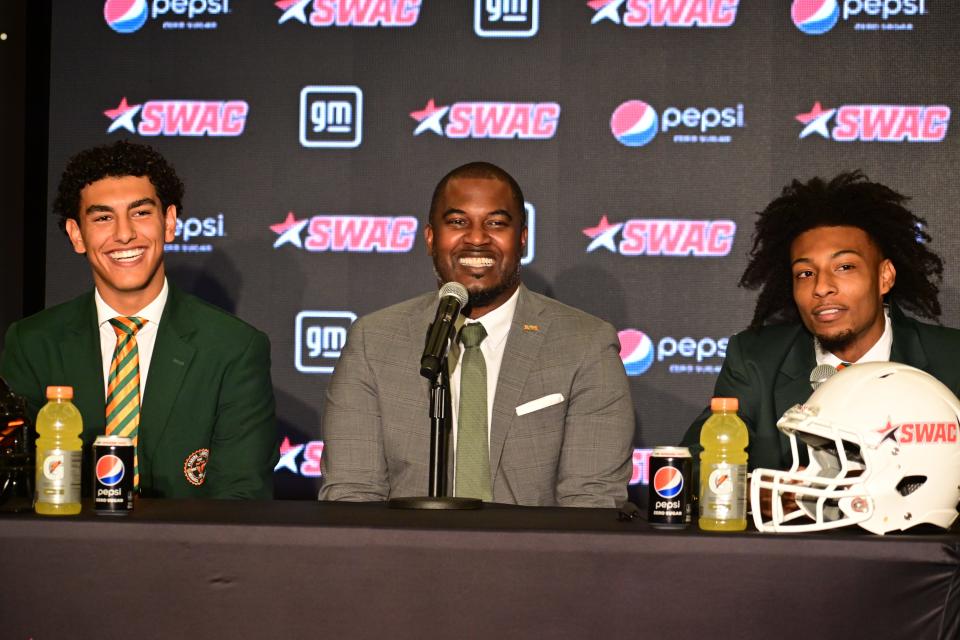 Left to right: Florida A&M Rattlers quarterback Jeremy Moussa, head coach Willie Simmons, safety Javan Morgan shares a laugh at Southwestern Athletic Conference (SWAC) Football Media Day at The Sheraton Hotel Ballroom in Birmingham, Alabama on Tuesday, July 25, 2023.