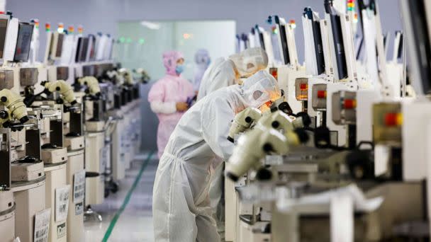 PHOTO: Employees work at a chip manufacturing company on April 19, 2022 in Suqian, Jiangsu Province of China. (Xu Changliang/VCG via Getty Images, FILE)