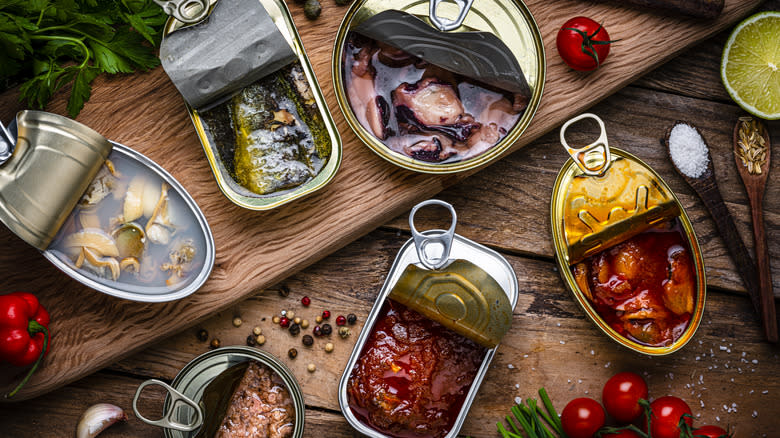 canned fish on wooden table