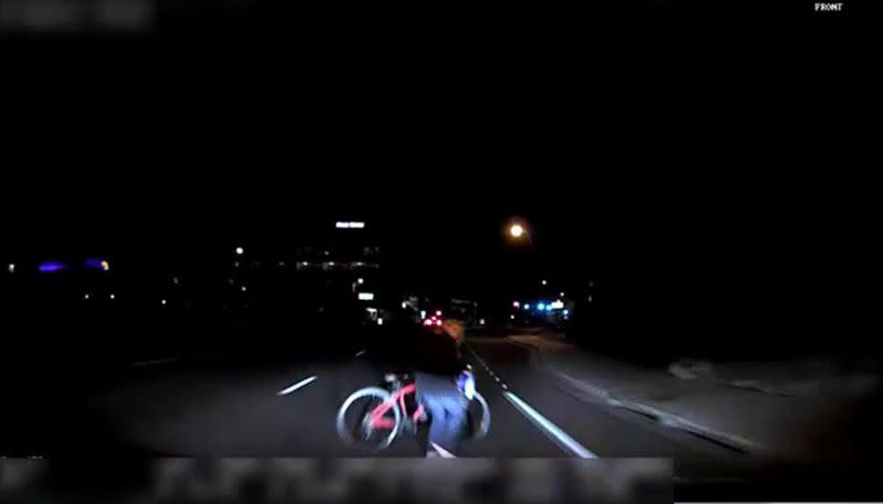 A still frame taken from video released March 21, 2018 shows the exterior view of the self-driving Uber vehicle leading up to the fatal collision in Tempe, Arizona, U.S. on March 18, 2018. Tempe Police Department/Handout via REUTERS