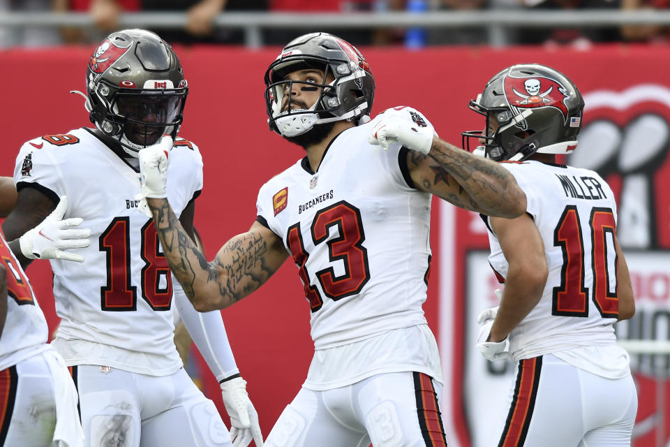 Tampa Bay Buccaneers wide receiver Mike Evans (13) celebrates his touchdown against the Atlanta Falcons during the first half of an NFL football game Sunday, Sept. 19, 2021, in Tampa, Fla. (AP Photo/Jason Behnken)