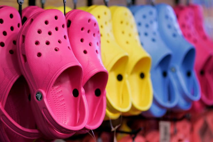 Crocs became running shoes — effective ones — for a father-son team. (Photo: Dina Rudick/The Boston Globe via Getty Images)