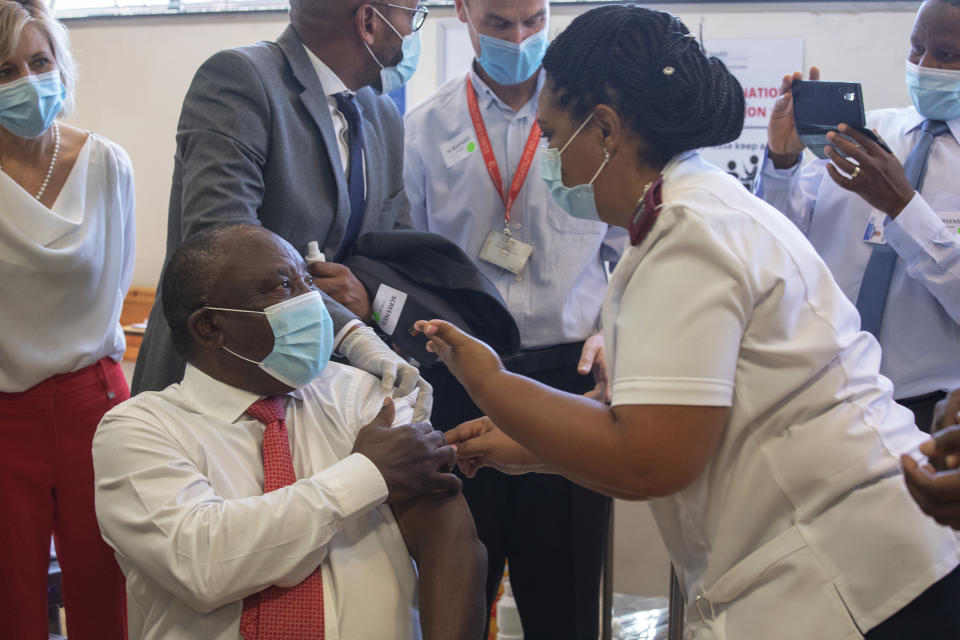 South African President Cyril Ramaphosa receives a Johnson and Johnson COVID-19 vaccine in Khayelitsha, Cape Town, South Africa, Wednesday, Feb. 17, 2021. Ramaphosa was among the first in his country to receive the vaccination to launch the inoculation drive in the country. (Gianluigi Guercia/Pool via AP)