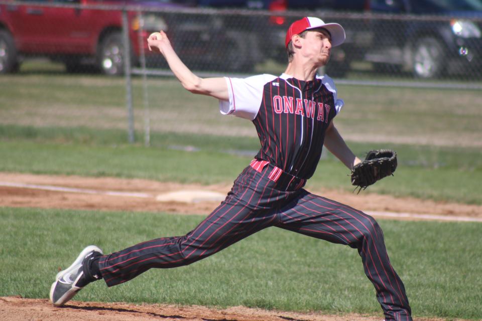 Onaway senior pitcher Cole Selke fires during game one of a baseball doubleheader at Pellston on Friday, May 3. Fighting through injuries, Selke has still been able to make major contributions for the Cardinals this spring.