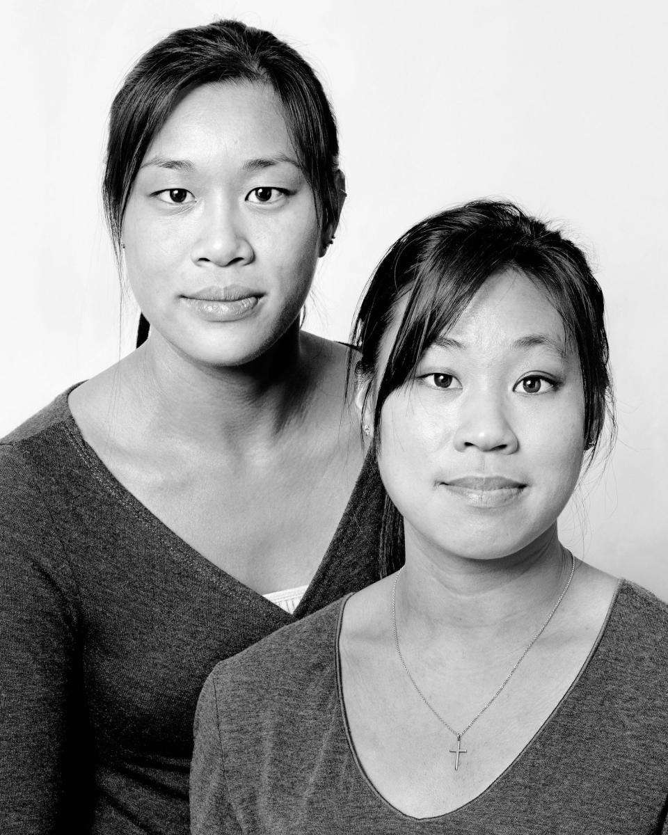 two look-alike women looking at the camera