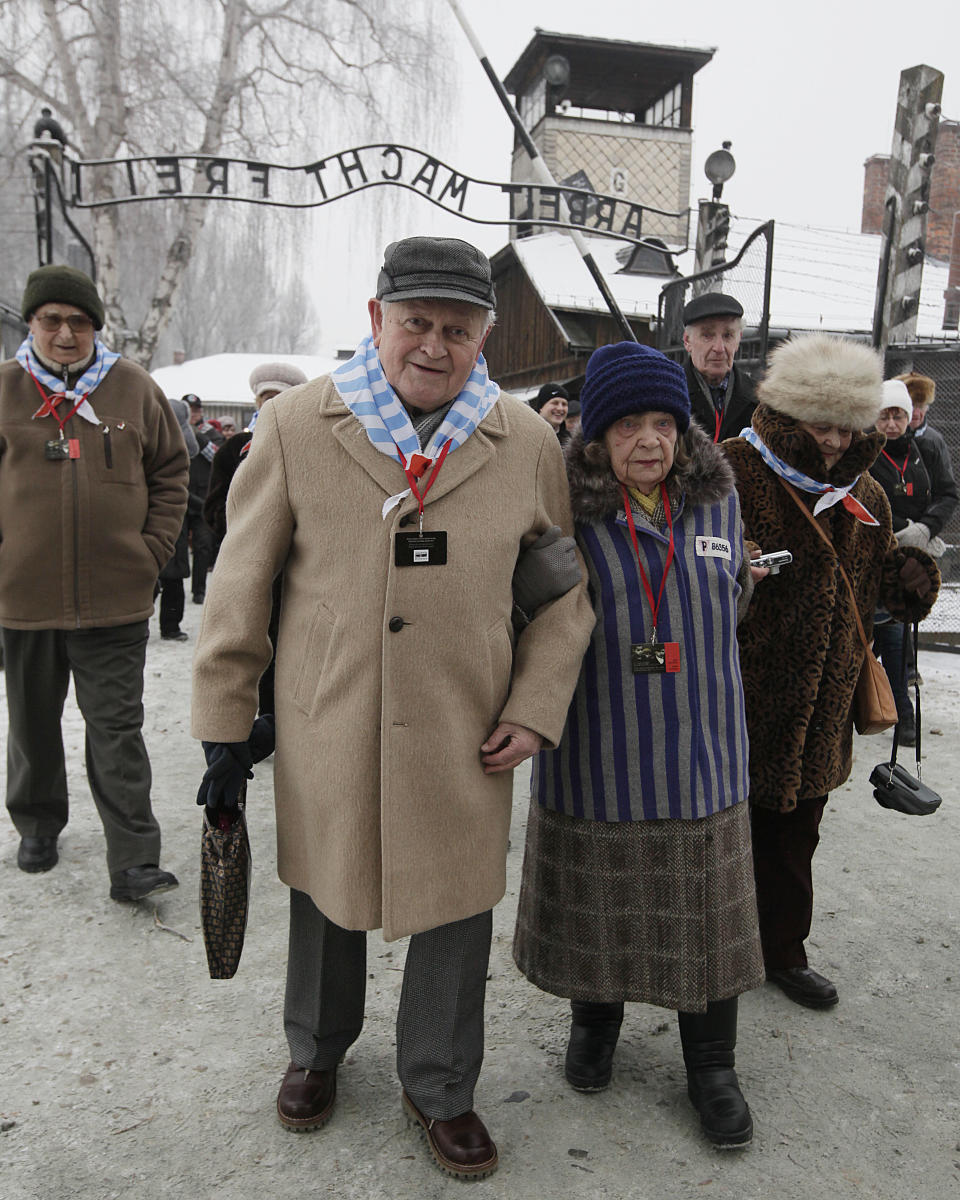 Holocaust survivors arrive for a ceremony to mark the 69th anniversary of the liberation of Auschwitz Nazi death camp's in Oswiecim, Poland, on Monday, Jan. 27, 2014, since the Soviet Red Army liberated the camp. Israeli lawmakers and government officials are to attend anniversary observances later in the day. The Nazis killed some 1.5 million people, mostly Jews at the camp during World War II. (AP Photo/Czarek Sokolowski)