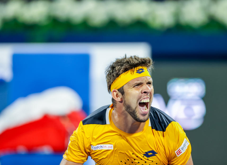 Pictured here, Jiri Vesely reacts after his stunning upset of Novak Djokovic in Dubai.