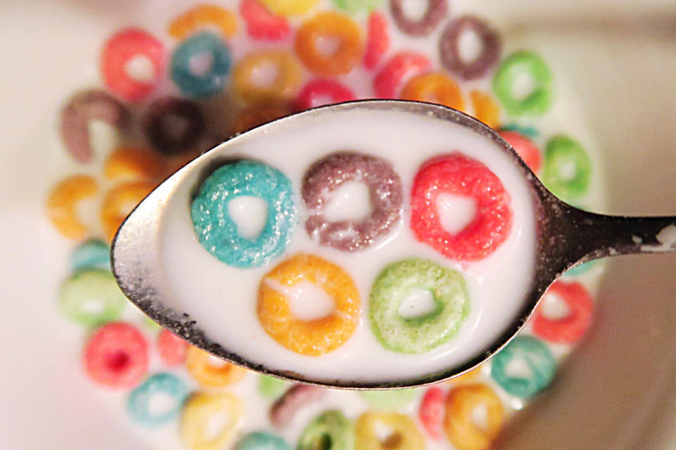 A spoonful of fruit loops and milk.