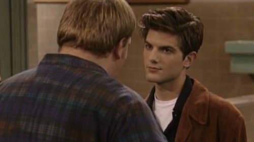 Adam looking at a man in a scene from Boy Meets World