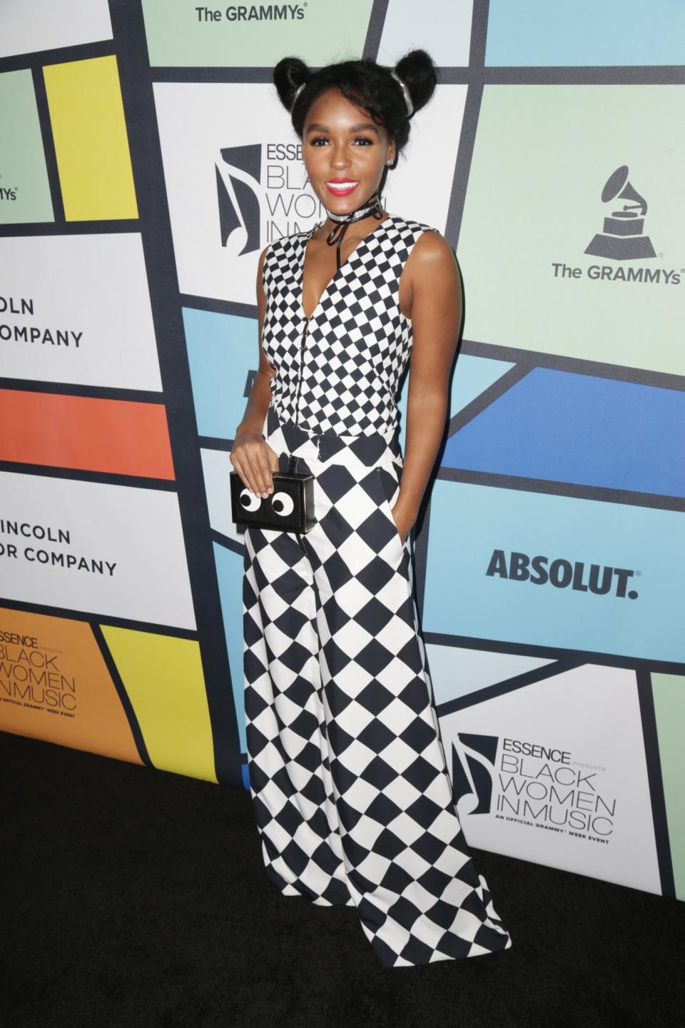 <p>Janelle is back to her monochrome ways, looking incredible in this harlequin-inspired jumpsuit. <i>[Photo: Getty]</i> </p>