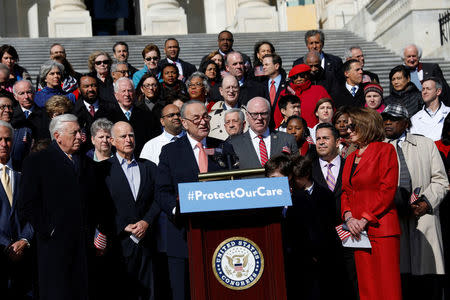 Senate Minority Leader Chuck Schumer speaks at an event marking the seventh anniversary of the passing of the Affordable Care Act outside the Capitol Building in Washington, U.S., March 22, 2017. REUTERS/Aaron P. Bernstein