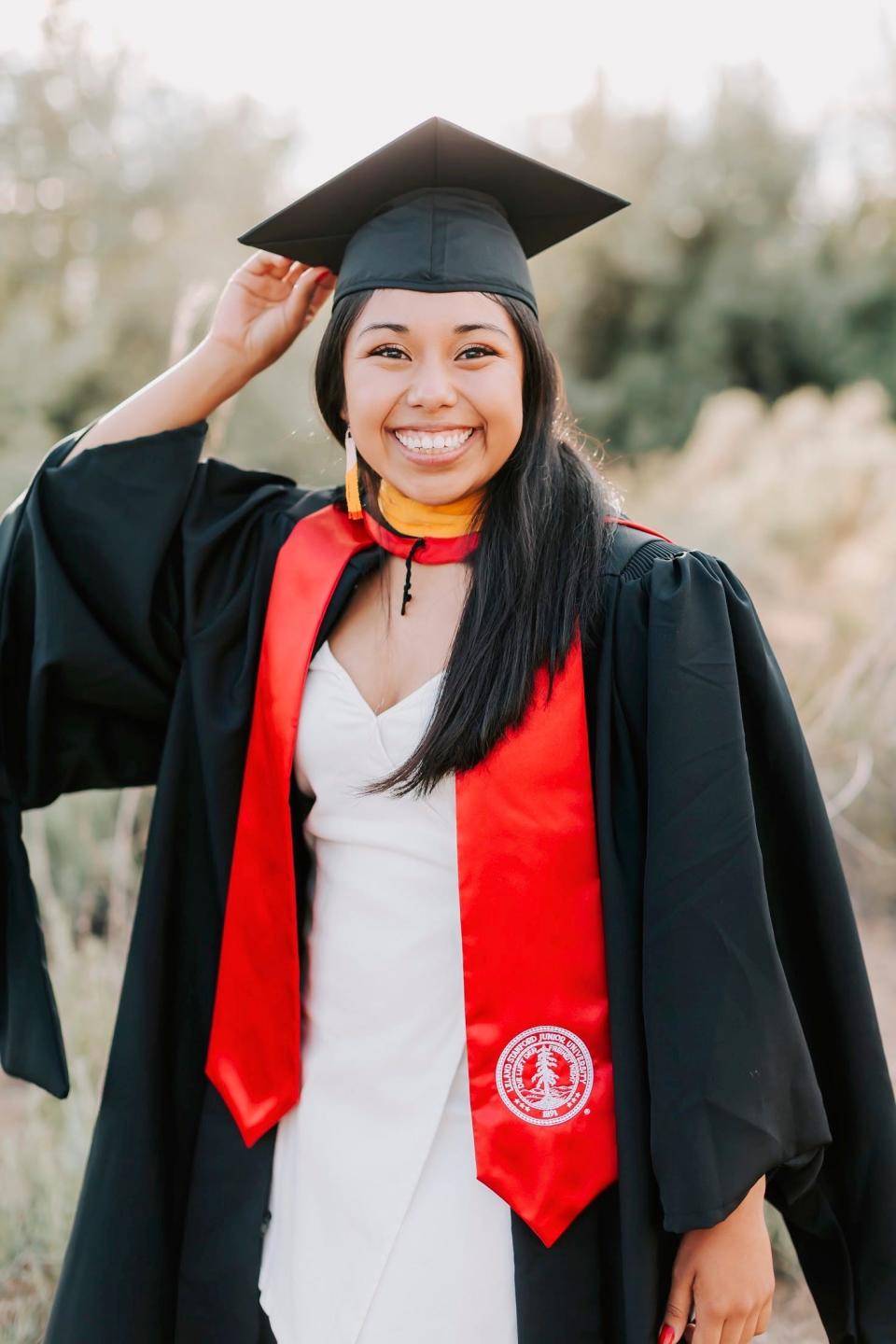 Gianna Nino-Tapias graduated with a master's degree in epidemiology from Stanford in June and is going back to start medical school this month. She wants to become a doctor so she can help people like her mother, who struggle to get proper help from doctors because they don't speak English well.