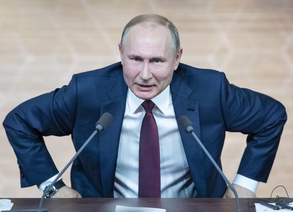 FILE In this file photo taken on Thursday, Dec. 19, 2019, Russian President Vladimir Putin leaves his annual news conference in Moscow, Russia. Russian President Vladimir Putin prepares to mark his 20th year in power, as the longest-serving leader since Joseph Stalin. (AP Photo/Pavel Golovkin, File)