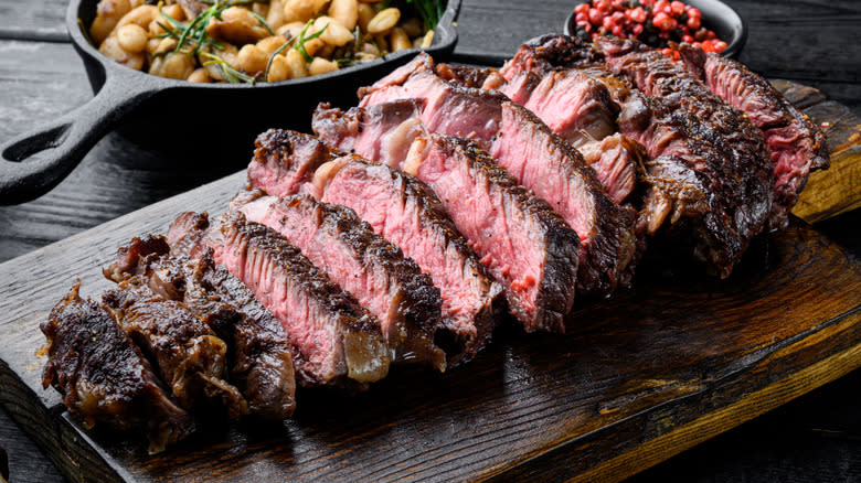 Ribeye steak on wooden board