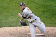 Oakland Athletics' pitcher Jake Diekman throws against the Minnesota Twins in the eighth inning of a baseball game, Saturday, May 15, 2021, in Minneapolis. (AP Photo/Jim Mone)