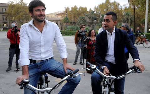 Mr Di Battista said he would continue to support Five Star and its candidate for prime minister, Luigi Di Maio (right) - Credit: Reuters