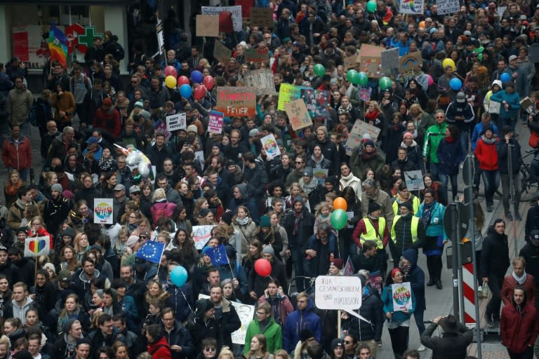 Demonstrators protest against the Alternative for Germany (AfD) in Cologne on April 22