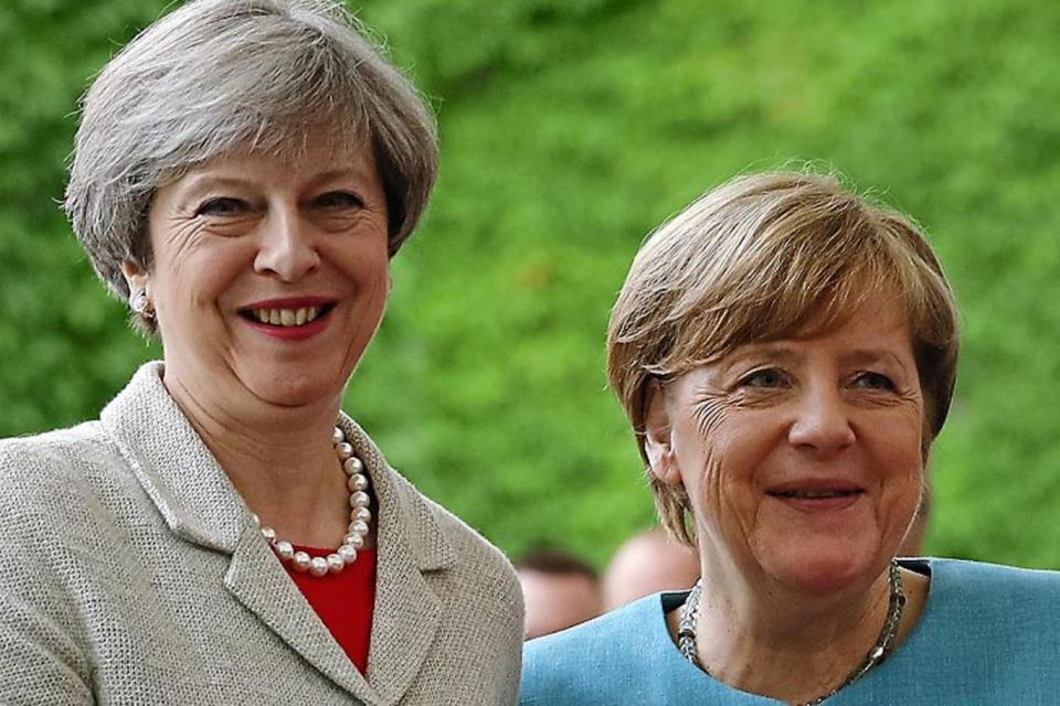 Talks: Theresa May and Angela Merkel have discussed negotiations over the phone (Getty Images)