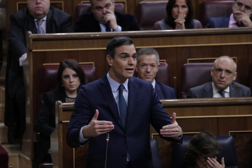 Spain's interim Prime Minister Pedro Sanchez speaks at the Spanish Parliament in Madrid, Spain, Sunday, Jan. 5, 2020. Sanchez is facing the first of two opportunities Sunday to win the endorsement of the Spanish Parliament to form a left-wing coalition government. It would be Spain's first coalition government since the return of democracy following the death of dictator Francisco Franco in 1975. (AP Photo/Manu Fernandez)