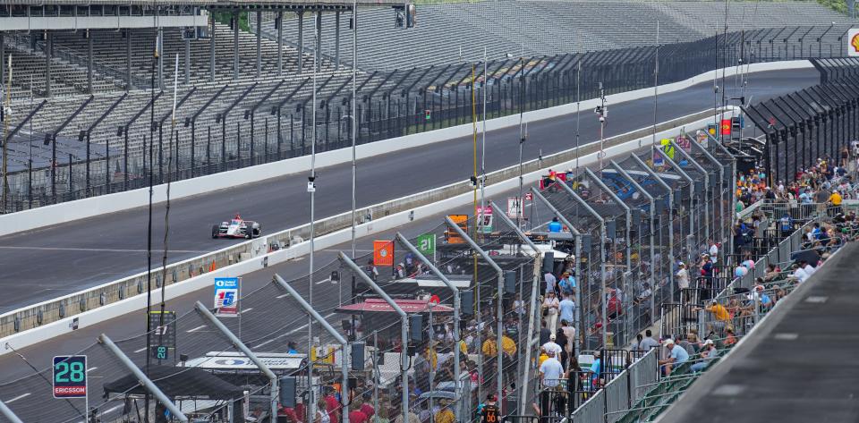 Racing fans fill pit lane Sunday, May 19, 2024, during practice ahead of qualifying for the 108th running of the Indianapolis 500 at Indianapolis Motor Speedway.