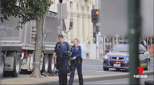 Police and emergency services attended the scene where a cyclist was fatally struck by a truck. Picture: 7 News