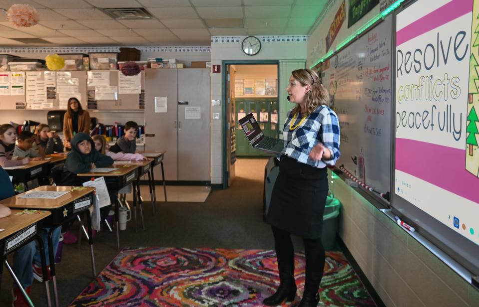 Sarah Simons, a Grand Ledge Public Schools counselor, speaks with fourth-graders at Willow Ridge Elementary, Wednesday, Jan. 10, 2024, on ways to resolve conflict through communication.