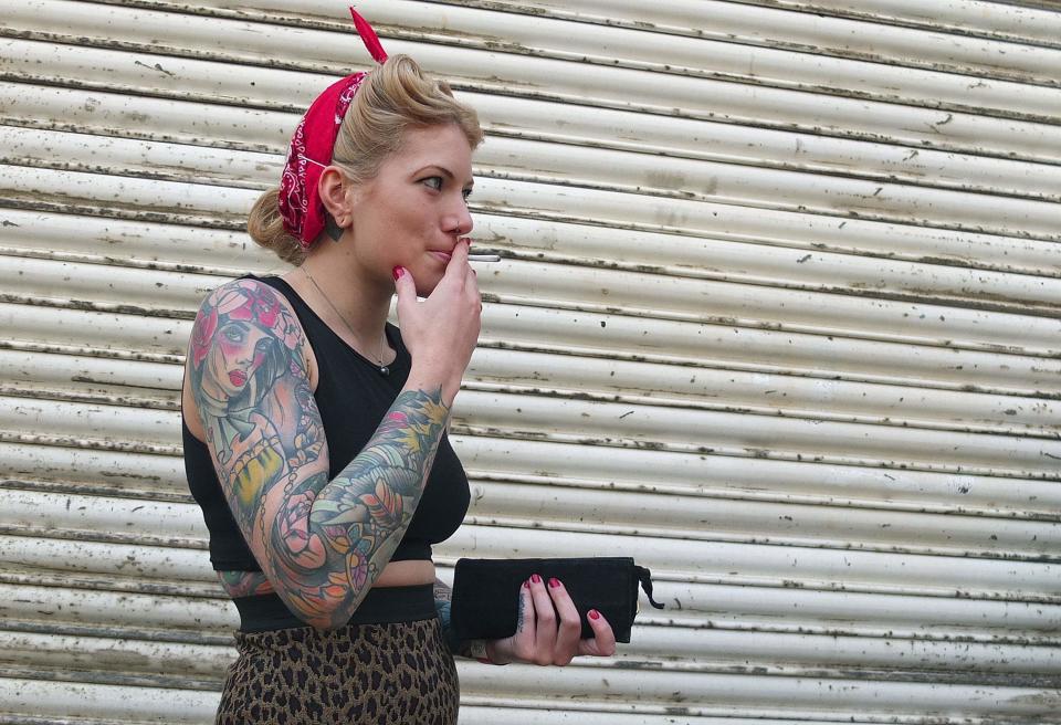 �Jen Lovell from Swansea tattoos cover both her arms, waist and the side of her little finger (Reuters)