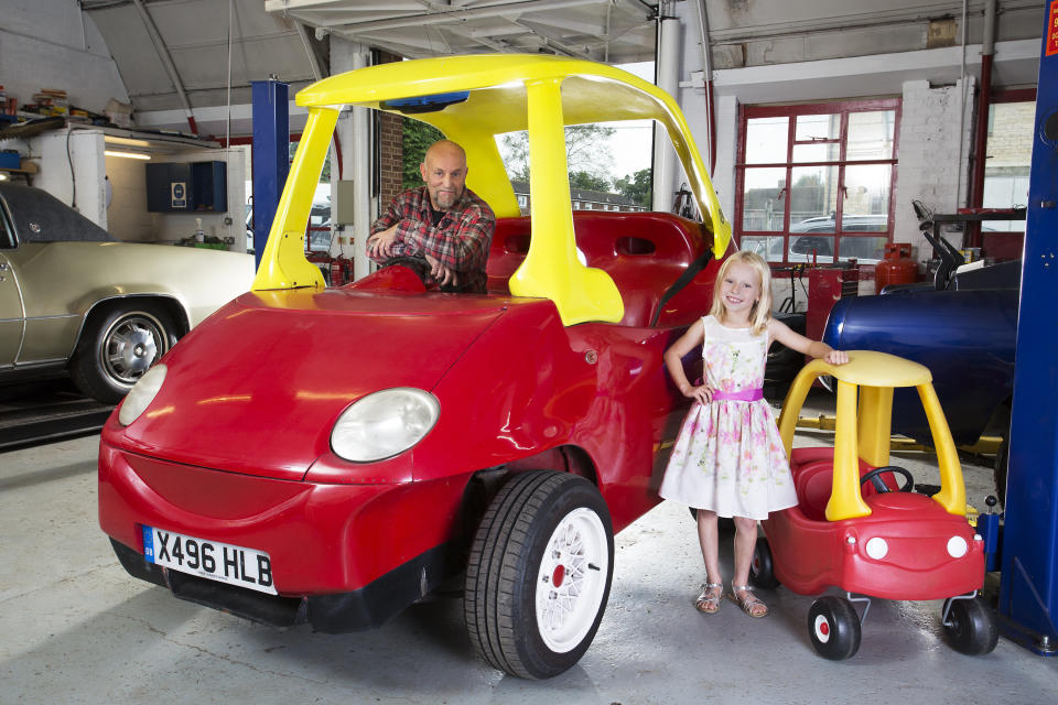 Brits Geof Bitmead (pictured) and John Bitmead built the world's largest Cozy Coupe: 8 feet, 10.2 inches.&nbsp;<br />