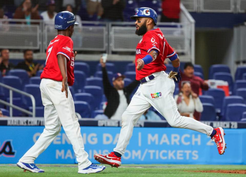 Dominican Republic outfielder Emilio Bonifacio (1) celebrates after scoring a run against Curacao in the eighth inning of a Caribbean Series baseball game on Tuesday, Feb. 6, 2024, in Miami, Fla.