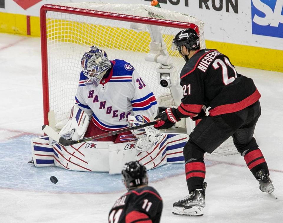 New York Rangers goalie Igor Shesterkin (31) stops a shot attempt by Carolina Hurricanes Nino Niederreiter (21) in the second period on Wednesday, May 18, 2022 during game one of the Stanley Cup second round at PNC Arena in Raleigh, N.C.