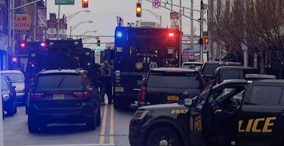 SWAT teams and officers surround the store in New Jersey. Source: USA Today