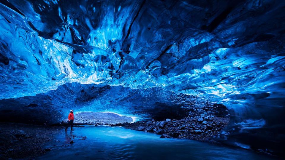 <p>Not gonna lie, photos of the <a href="https://alaskashoretours.com/mendenhall-ice-caves-beyond-juneau-glacier-tours-explained/" rel="nofollow noopener" target="_blank" data-ylk="slk:Mendenhall Ice Caves;elm:context_link;itc:0;sec:content-canvas" class="link ">Mendenhall Ice Caves</a> look Photoshopped. Inside the caves, water runs under ceilings inside a partially hollowed-out glacier. This destination is a true reward for the explorer, as the only way to get to this 12-mile stretch of caves is to kayak in — and then ice-climb over the glacier. </p><p>Visit sooner rather than later, as the Mendenhall Glacier has unfortunately receded almost 2 miles since 1958 as a result of glacial melting. </p>