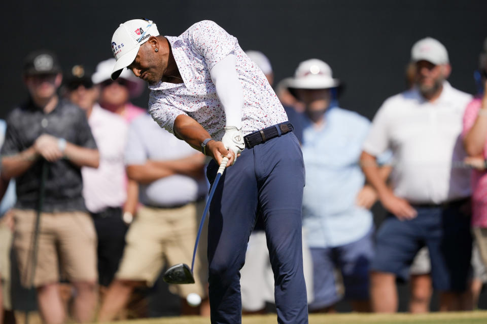 Willie Mack III hits his tee shot on the 14th hole during the first round of the U.S. Open golf tournament Thursday, June 13, 2024, in Pinehurst, N.C. (AP Photo/Matt York)