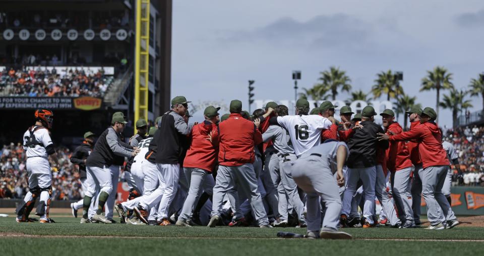 Buster Posey stood on the outside of the brawl but became a central figure. (AP)