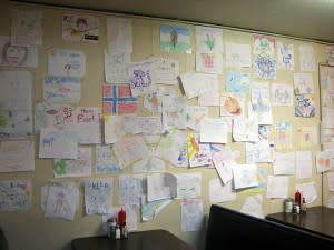 Wall full of scribbled notes