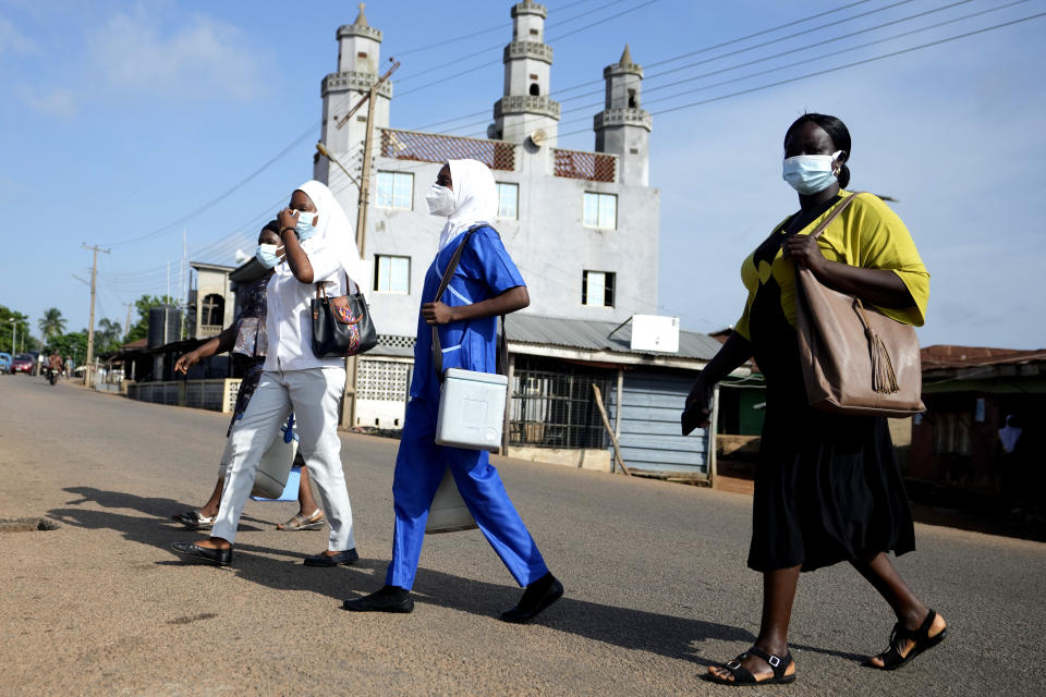 Health workers arrive to administer cervical cancer vaccine HPV Gardasil to young girls on the street in Ibadan, Nigeria, on May 27, 2024. African countries have some of the world's highest rates of cervical cancer. Growing efforts to vaccinate more young girls for the human papillomavirus are challenged by the kind of vaccine hesitancy seen for some other diseases. Misinformation can include mistaken rumors that girls won't be able to have children in the future. Some religious communities must be told that the vaccine is "not ungodly." More than half of Africa's 54 nations – 28 – have introduced the vaccine in their immunization programs, but only five have reached the 90% coverage that the continent hopes to achieve by 2030. (AP Photo/Sunday Alamba)