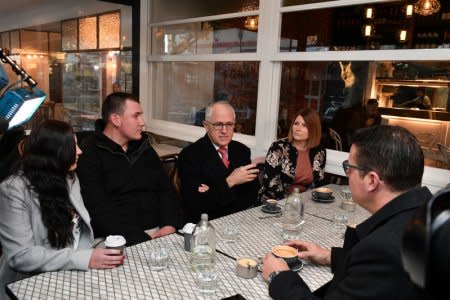 Prime Minister Malcolm Turnbull visits a cafe to speak on his government's income tax cuts in Manuka, Canberra, Australia, June 25, 2018. AAP/Mick Tsikas/via REUTERS