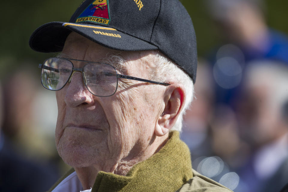 World War II veteran Clarence Smoyer, 96, sits before receiving the Bronze Star at the World War II Memorial, Wednesday, Sept. 18, 2019, in Washington. Smoyer fought with the U.S. Army's 3rd Armored Division, nicknamed the Spearhead Division. In 1945, he defeated a German Panther tank near the cathedral in Cologne, Germany — a dramatic duel filmed by an Army cameraman that was seen all over the world. (AP Photo/Alex Brandon)