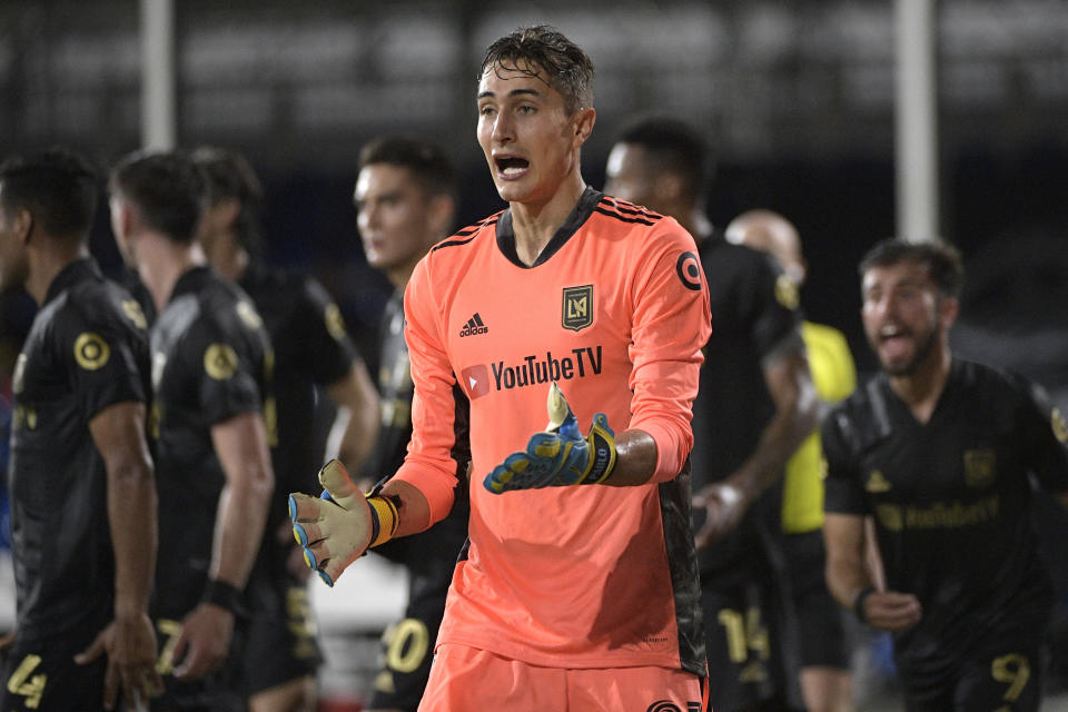 Los Angeles FC goalkeeper Pablo Sisniega argues a call by an official during the first half of an MLS soccer match against the LA Galaxy, Saturday, July 18, 2020, in Kissimmee, Fla. (AP Photo/Phelan M. Ebenhack)