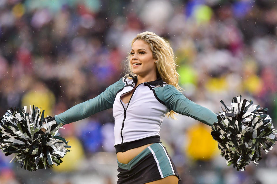 <p>An Eagles cheerleader performs in the rain during the NFL game between the San Francisco 49ers and the Philadelphia Eagles on October 29, 2017 at Lincoln Financial Field in Philadelphia PA. (Photo by Gavin Baker/Icon Sportswire via Getty Images) </p>