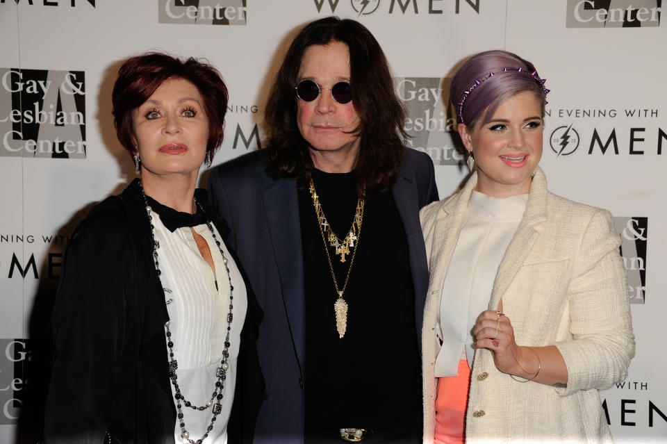 From left, Sharon Osbourne, Ozzy Osbourne, and Kelly Osbourne arrive at the 2013 "An Evening With Women" event at the Beverly Hilton Hotel on Saturday, May 18, 2013 in Los Angeles. (Photo by Richard Shotwell/Invision/AP)