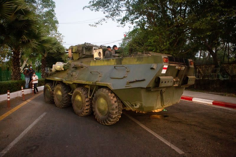 An armoured vehicle is seen on a street in Yangon