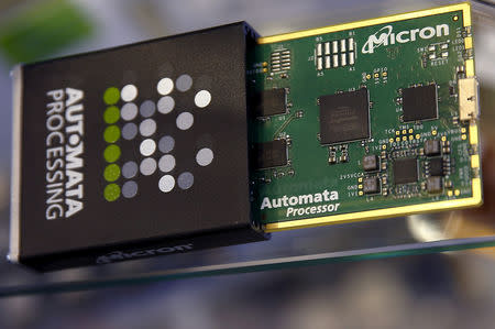 FILE PHOTO: Memory chip parts of U.S. memory chip maker MicronTechnology are pictured at their booth at an industrial fair in Frankfurt, Germany, July 14, 2015. REUTERS/Kai Pfaffenbach