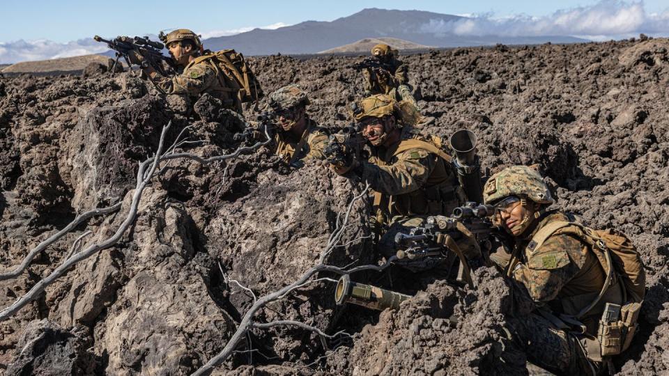 Marines assigned to 3rd Littoral Combat Team, 3rd Marine Littoral Regiment, 3rd Marine Division, pull security at Pohakuloa Training Area, Hawaii, Nov. 7, 2023. (Spc. Mariah Aguilar/Army)