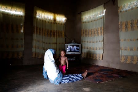 The Wider Image: Tanzania's Zanzibar begins to register traditional healers