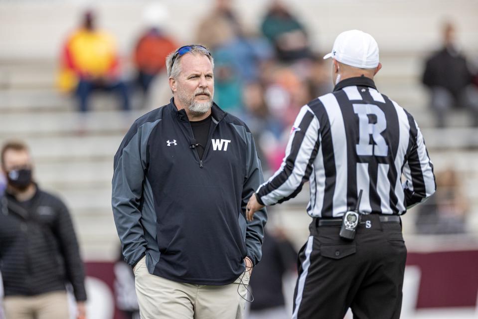 West Texas A&M's head coach, Hunter Hughes, discusses a call with the referee on April 17, 2021 at Buffalo Stadium in Canyon, TX.