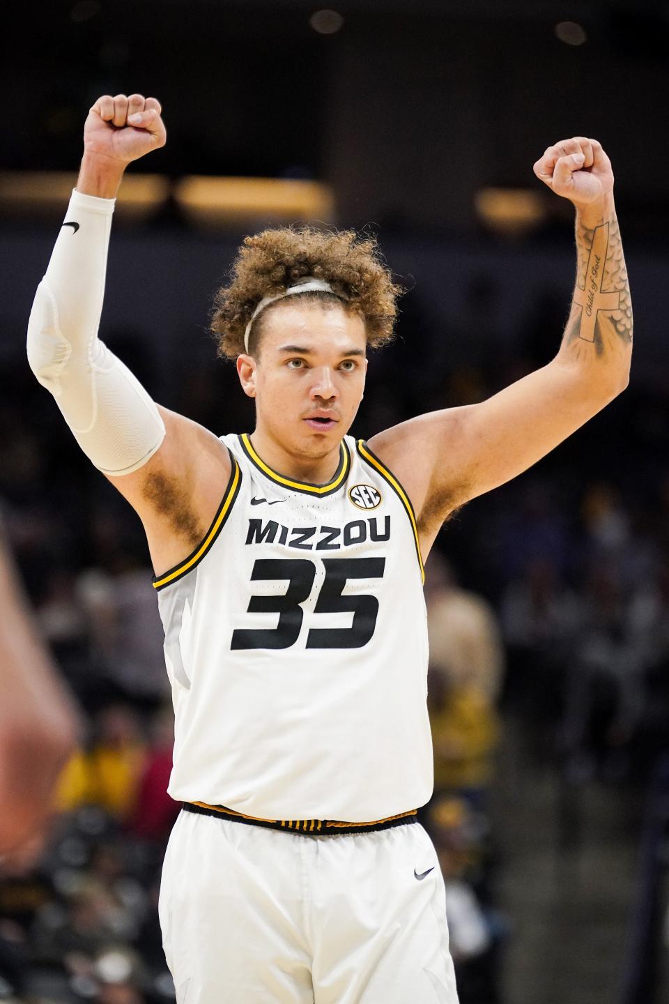 Dec 30, 2023; Columbia, Missouri, USA; Missouri Tigers forward Noah Carter (35) celebrates after a free throw against the Central Arkansas Bears during the first half at Mizzou Arena. Mandatory Credit: Denny Medley-USA TODAY Sports